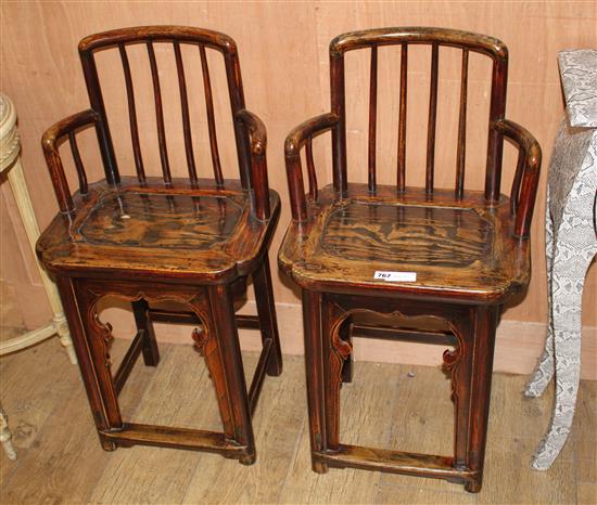 A pair of Chinese elm wood chairs, W.44cm D.33cm H.68cm